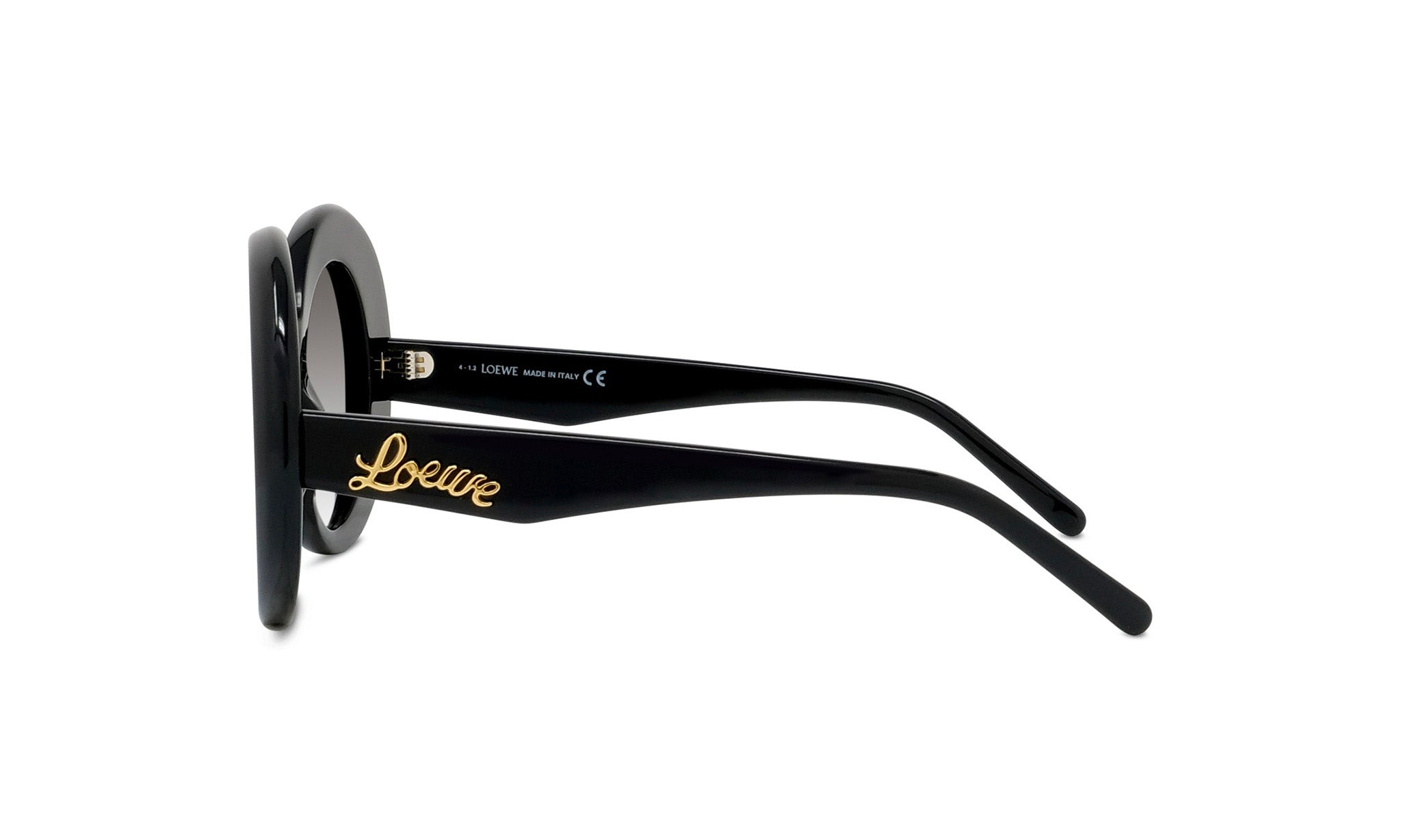 A pair of black sunglasses with gold text on the frame.