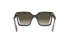 A pair of dark-colored sunglasses with a gradient lens design.