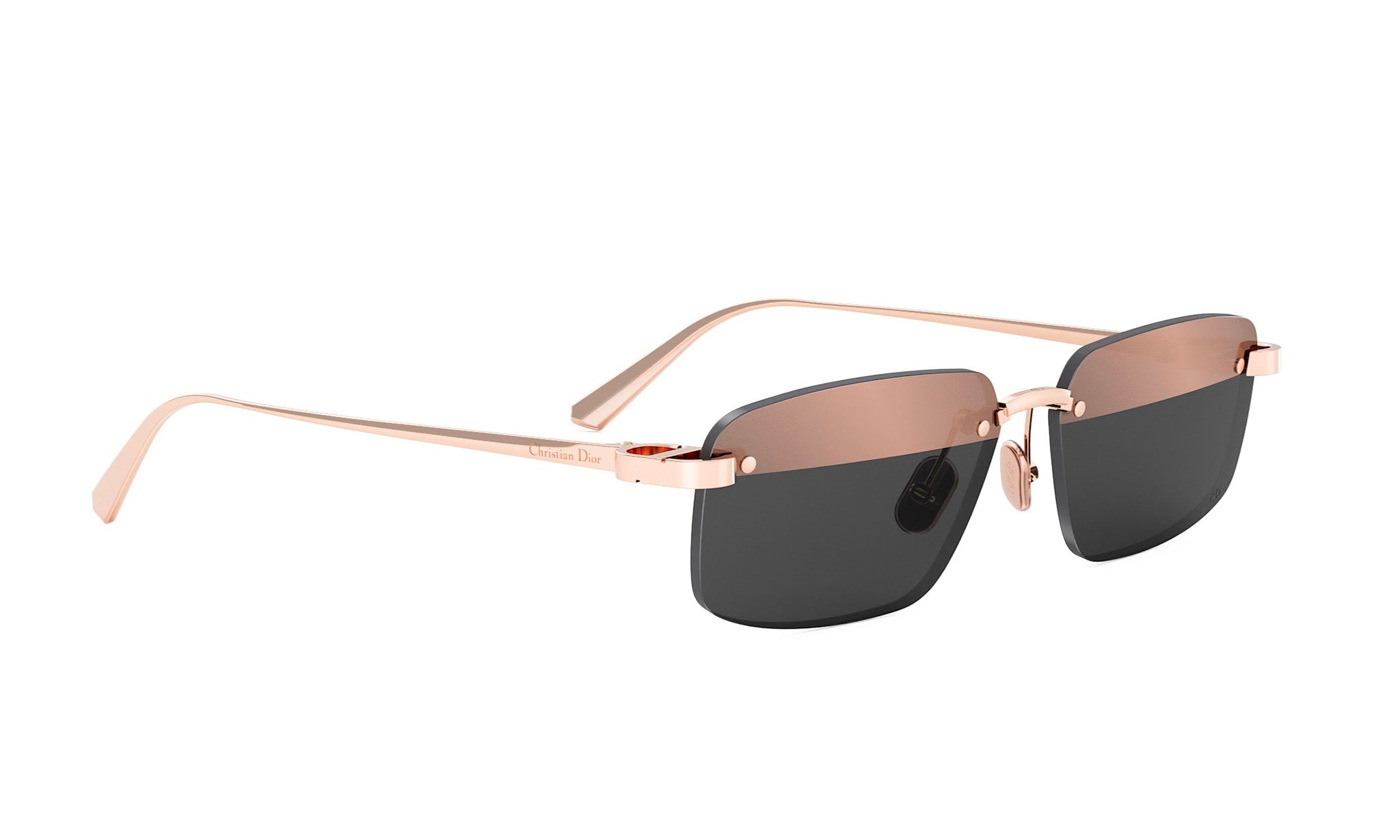 A pair of gold-toned rimless sunglasses with dark lenses.