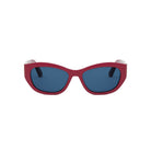 A pair of red cat-eye sunglasses with dark blue lenses.