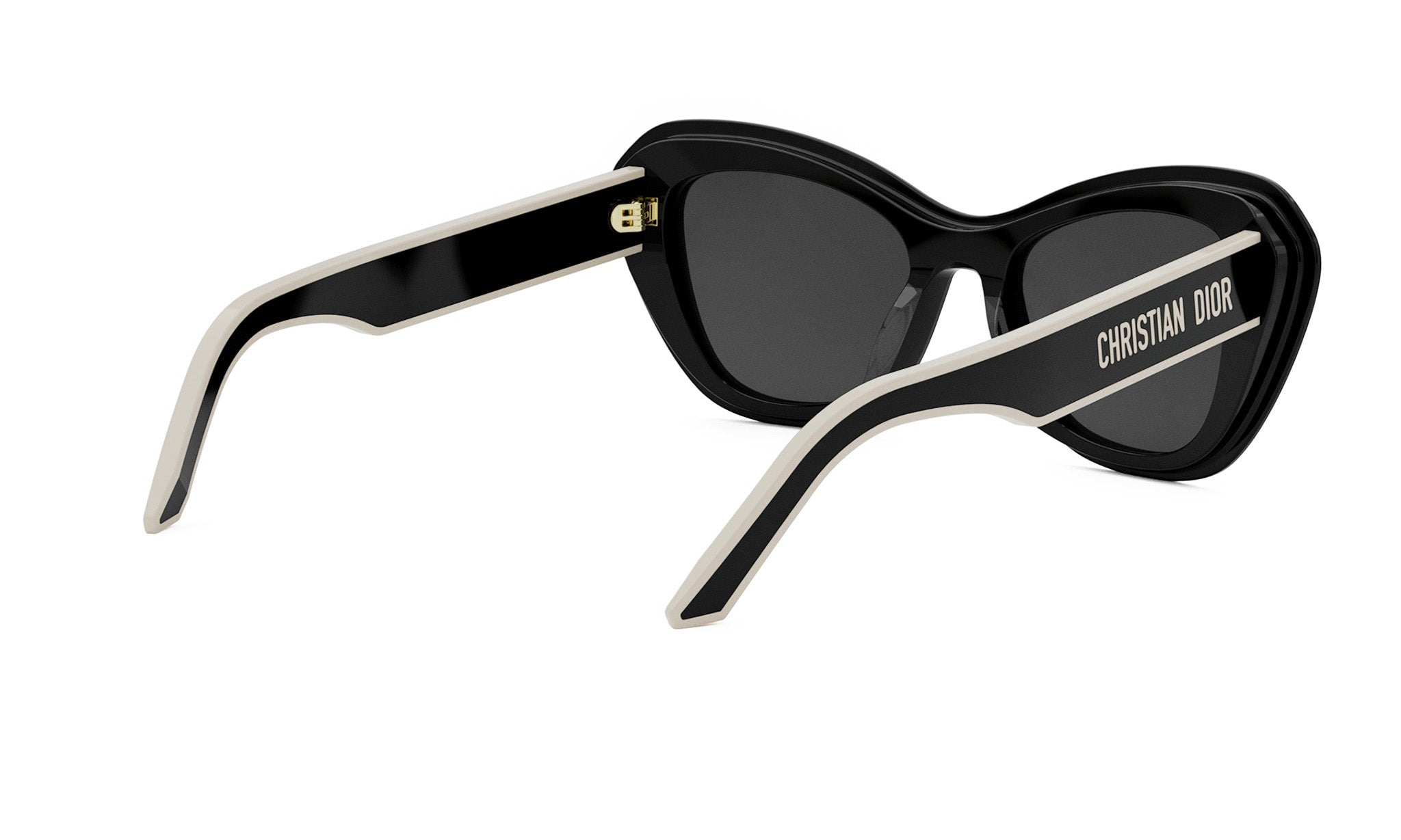 A pair of black sunglasses with a white frame and the brand name "Christian Dior" printed on the side.