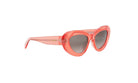 A pair of bright pink, heart-shaped sunglasses with a distinctive design.