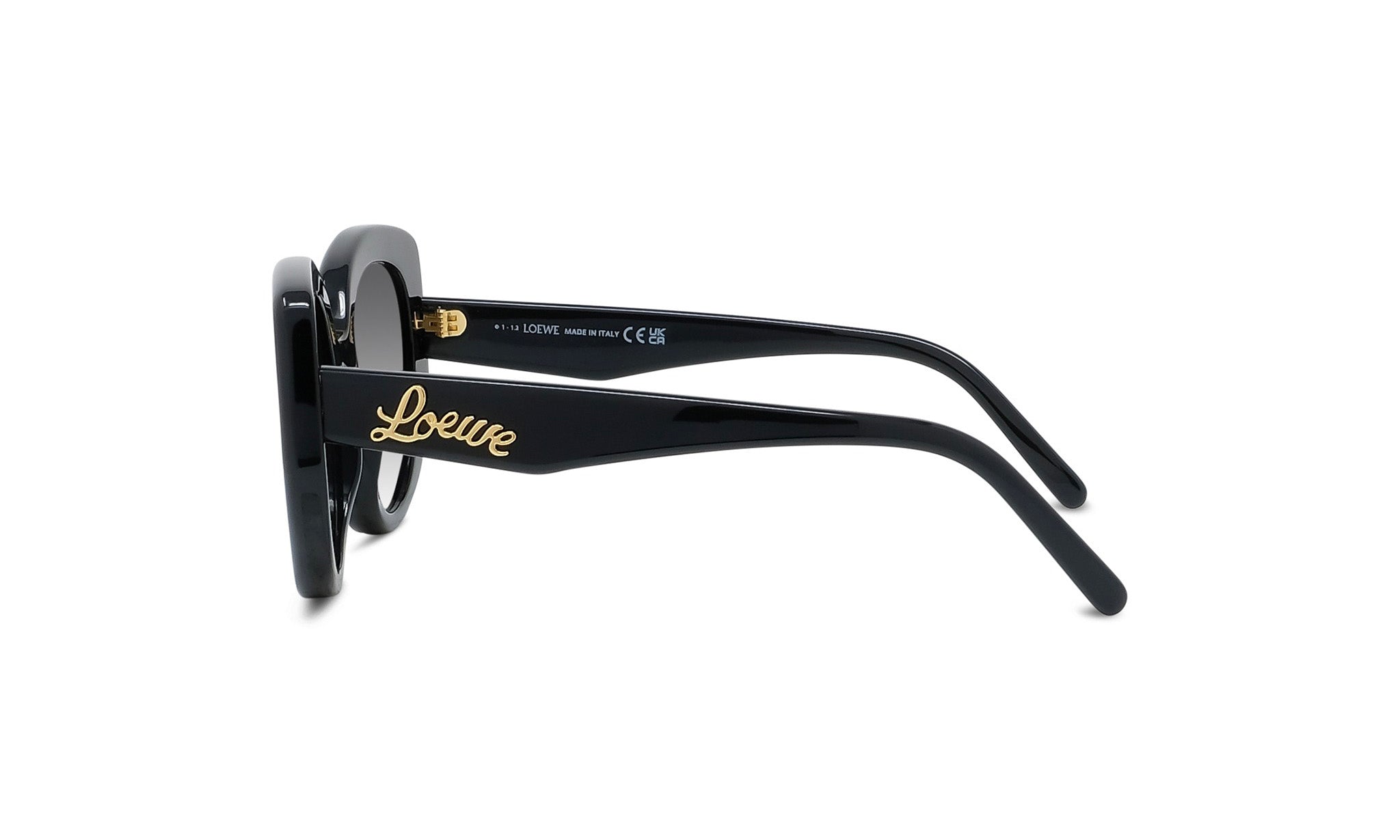 A pair of black sunglasses with gold text on the frame.
