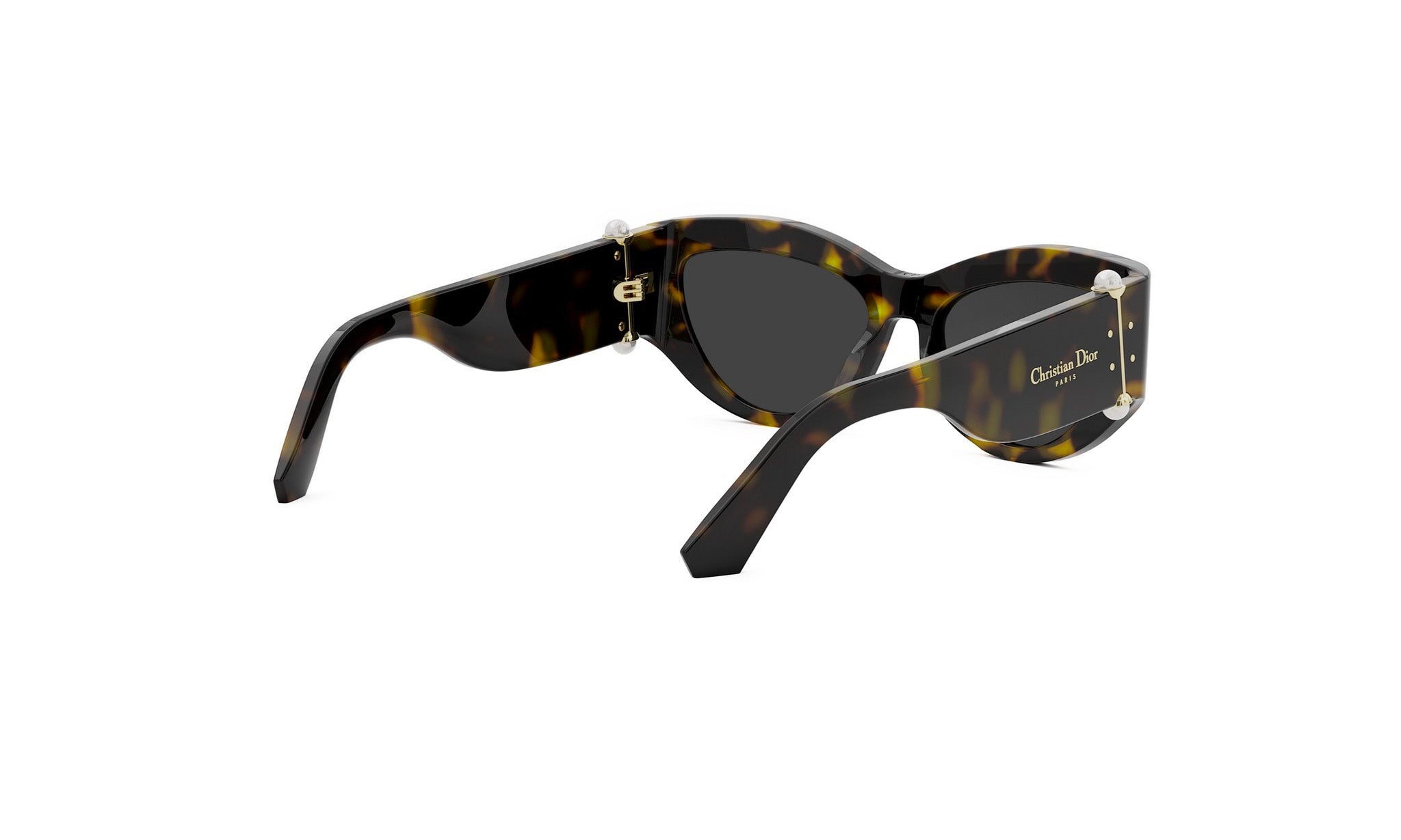 A pair of sunglasses with a tortoiseshell frame and dark lenses.