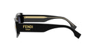 A pair of black sunglasses with gold accents and the Fendi logo on the frame.