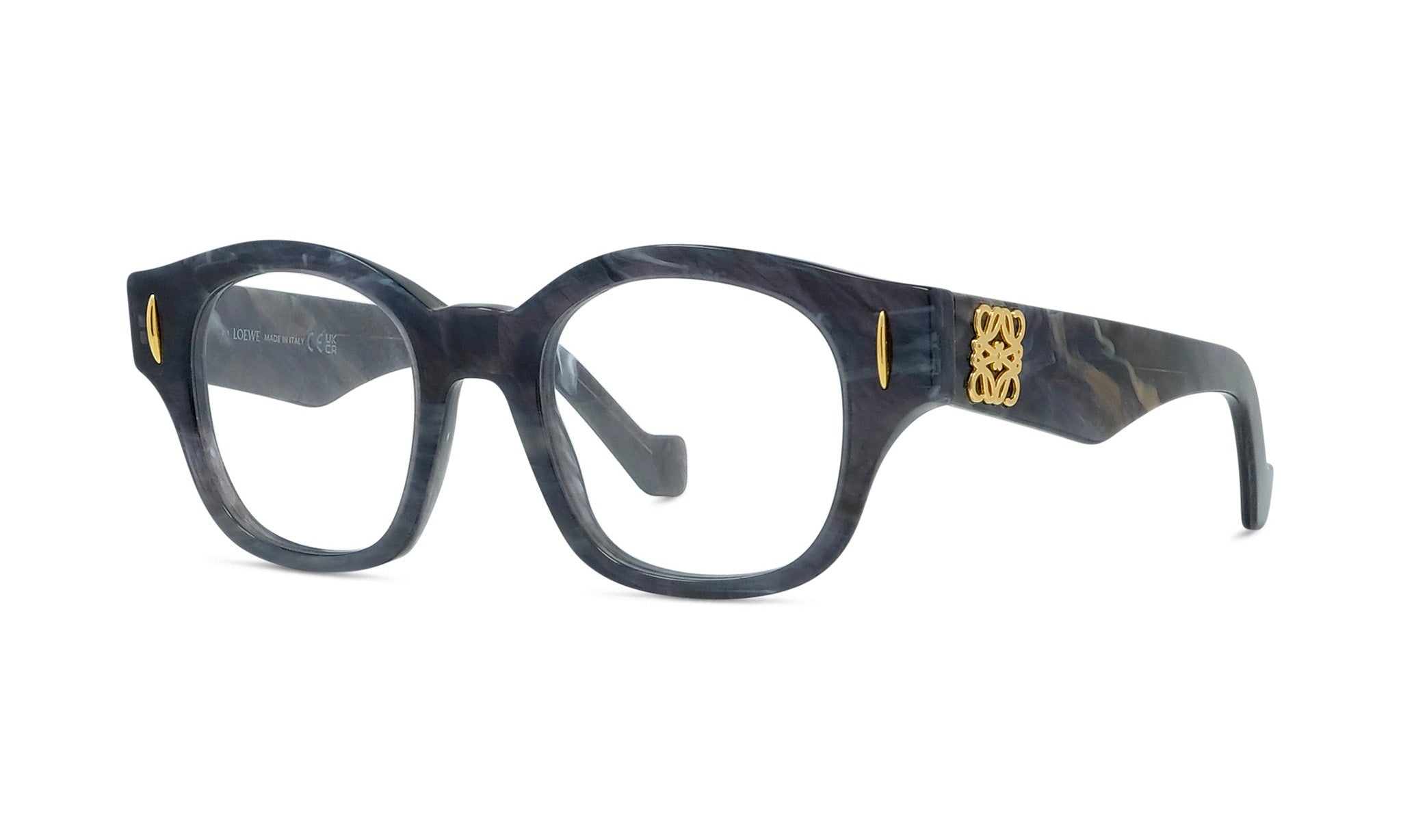 A pair of stylish, black-framed glasses with gold accents, featuring a distinctive logo on the side.