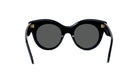 A pair of black cat-eye sunglasses with dark lenses.