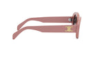 A pair of pink sunglasses with a gold logo on the frame.