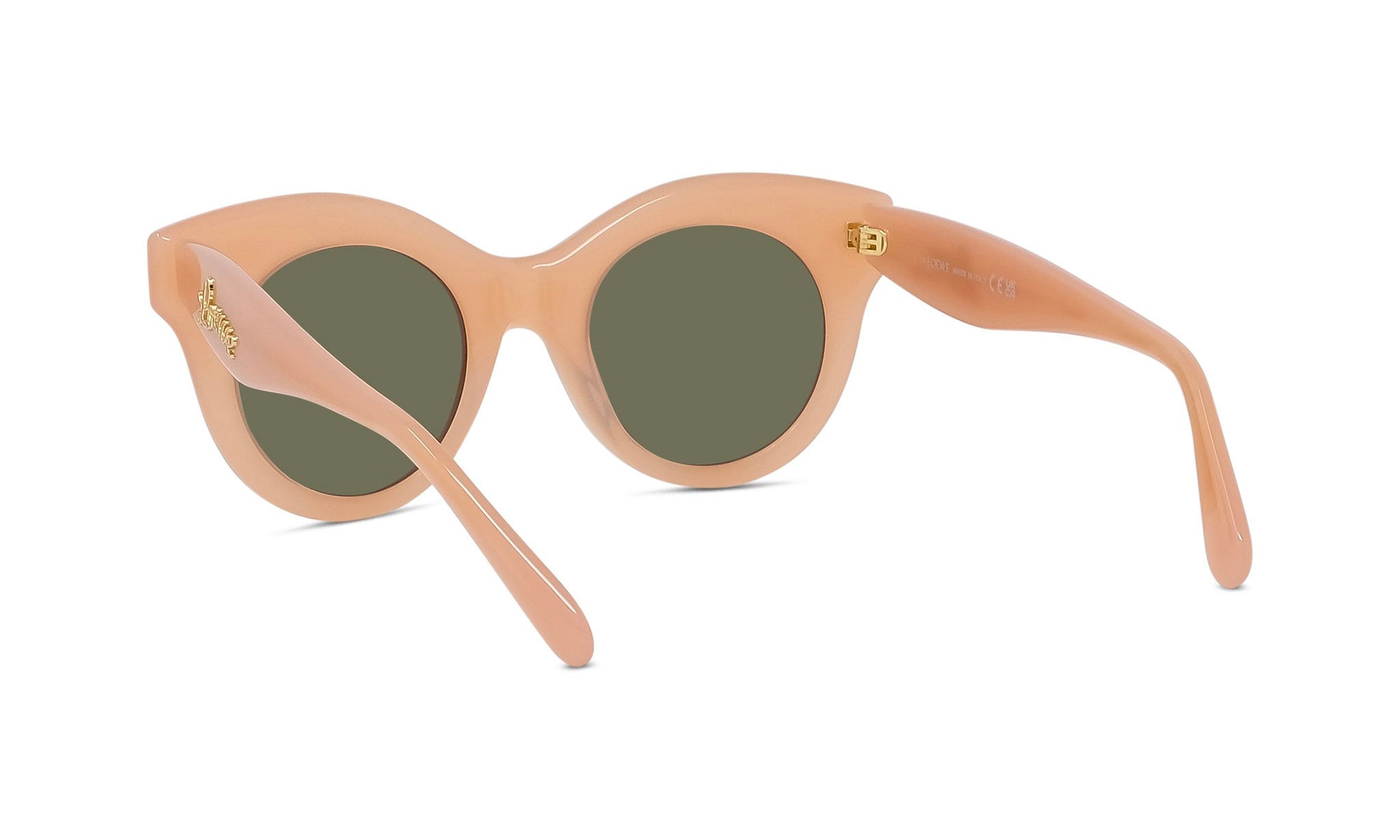 A pair of peach-colored sunglasses with dark green lenses.