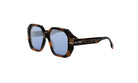 A pair of stylish sunglasses with a tortoiseshell frame and blue lenses.