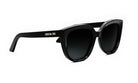 A pair of black cat-eye sunglasses with the brand name "Christian Dior" printed on the frame.