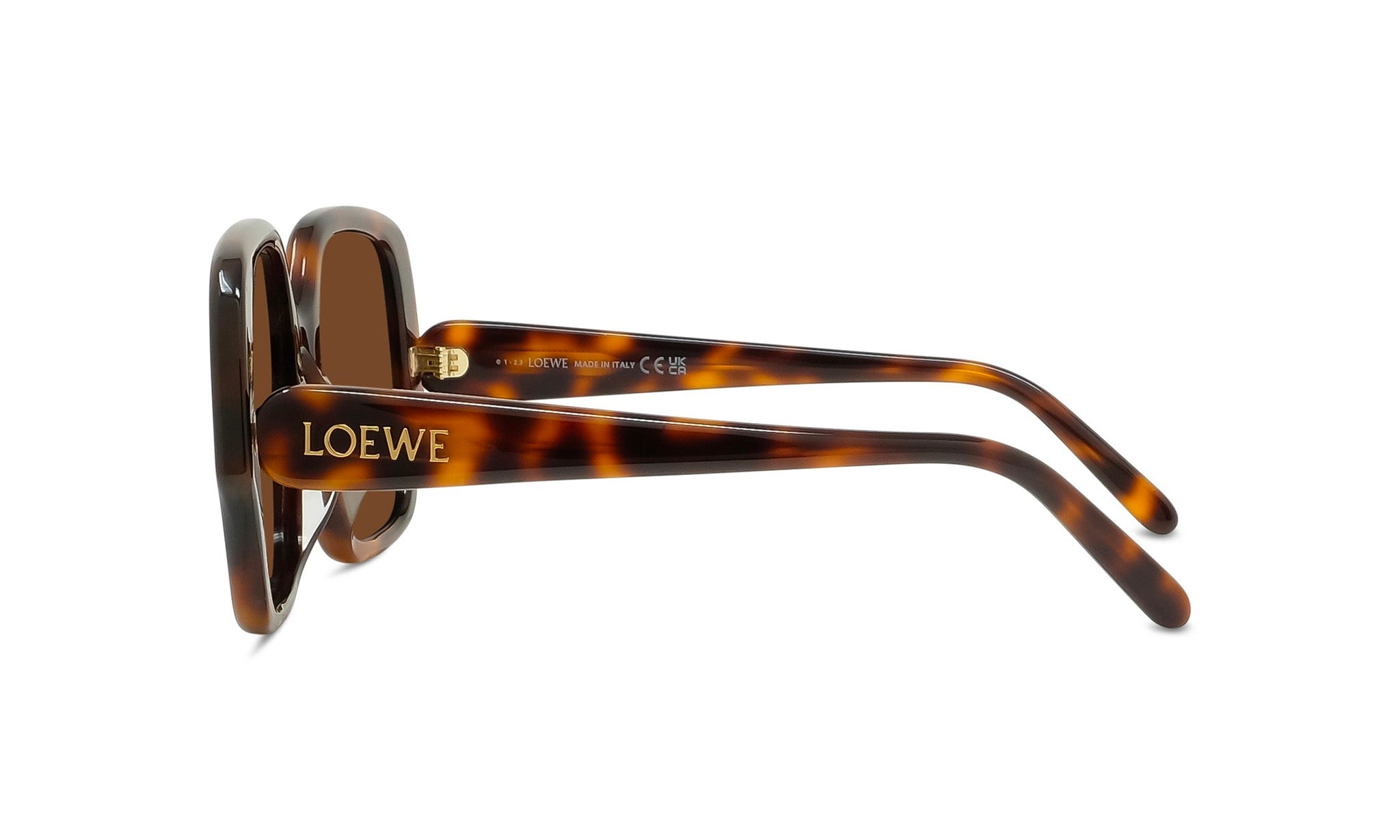 A pair of brown sunglasses with the LOEWE brand name visible on the frame.