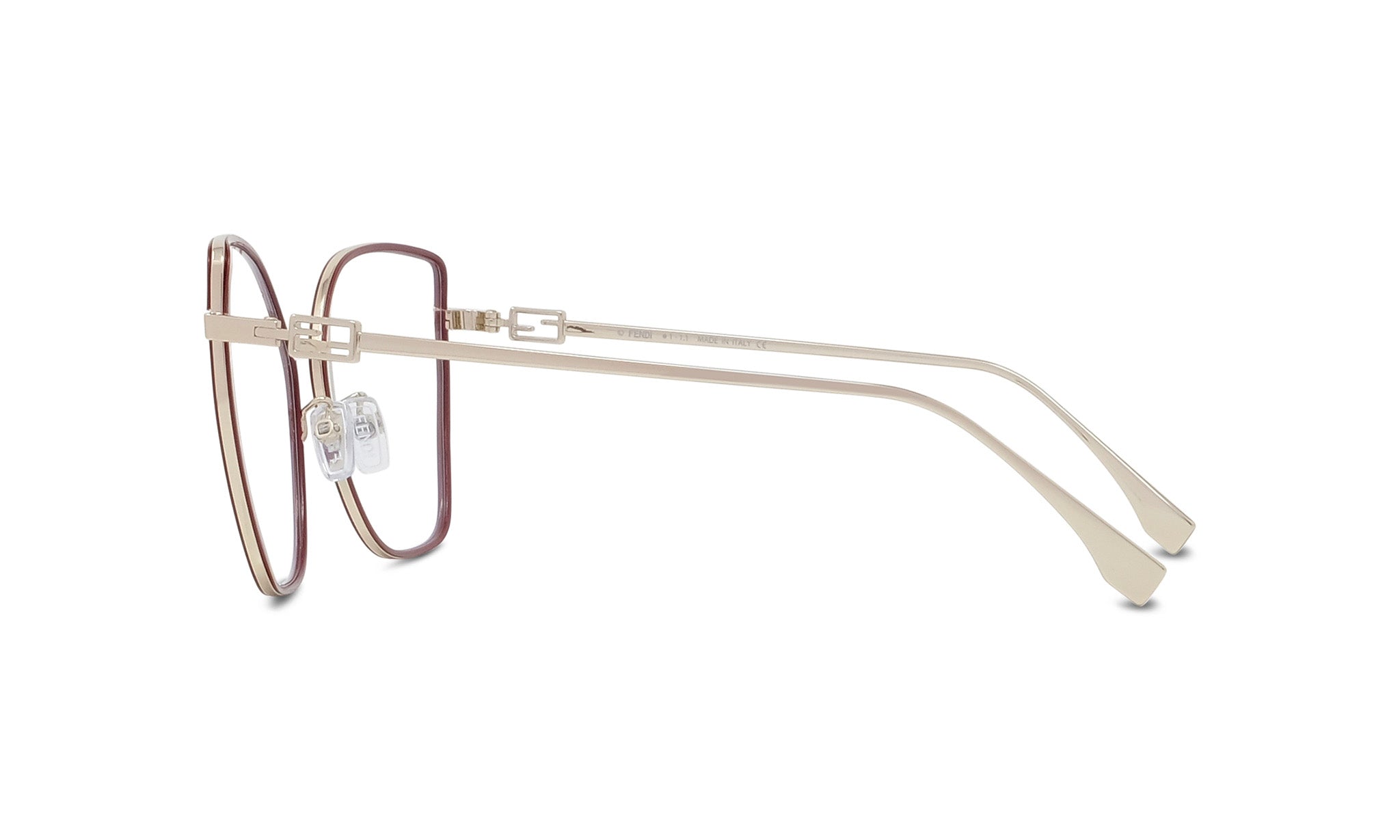 A pair of stylish, gold-colored eyeglasses with a sleek, modern design.