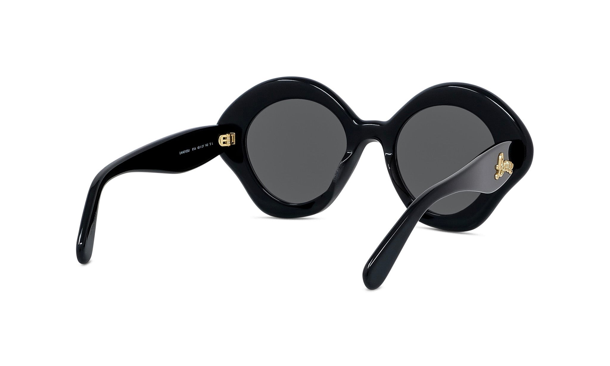 A pair of black, round sunglasses with gold accents.