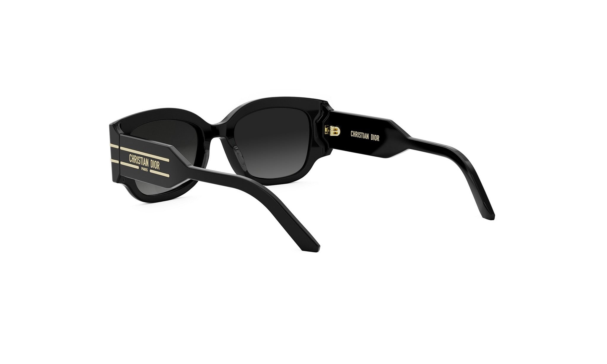 A pair of black sunglasses with gold accents and the Christian Dior logo.