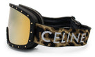 A pair of googles with a camouflage pattern and the word "Celine" printed on the strap.