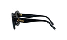 A pair of black sunglasses with gold text on the frame.