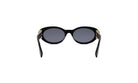 A pair of black sunglasses with gold accents, featuring dark lenses and a sleek, modern design.