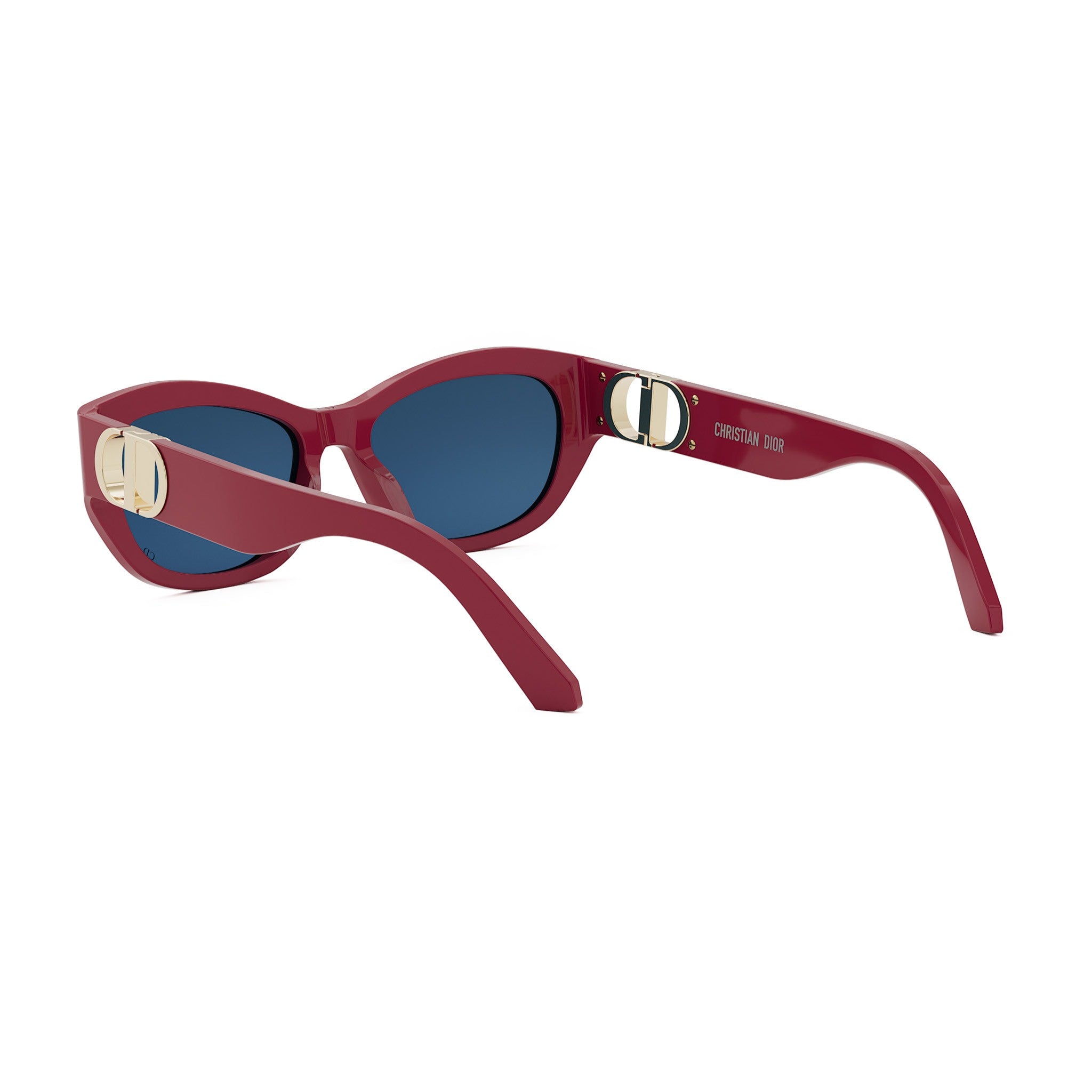 A pair of red sunglasses with blue lenses, featuring a gold-colored Dior logo on the temples.