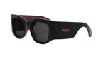 A pair of black sunglasses with a red frame.