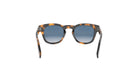A pair of sunglasses with a tortoiseshell frame and dark blue lenses.