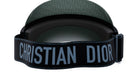 A black and gray strap with the word "CHRISTIAN DIOR" printed on it.