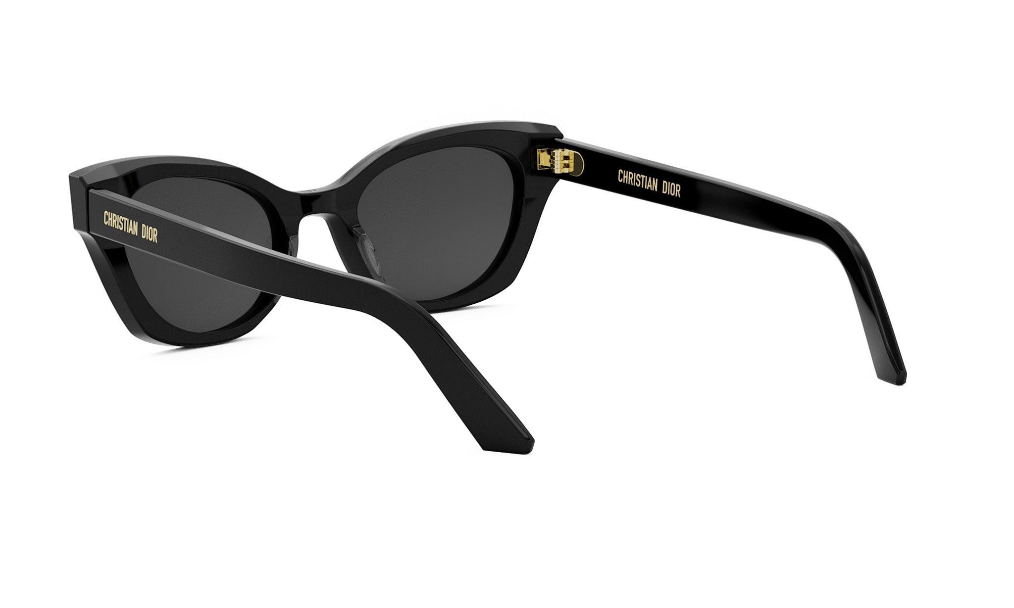 A pair of black cat-eye sunglasses with gold accents, featuring the Christian Dior logo on the temples.