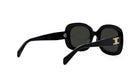 A pair of black sunglasses with a gold C logo on the frame.