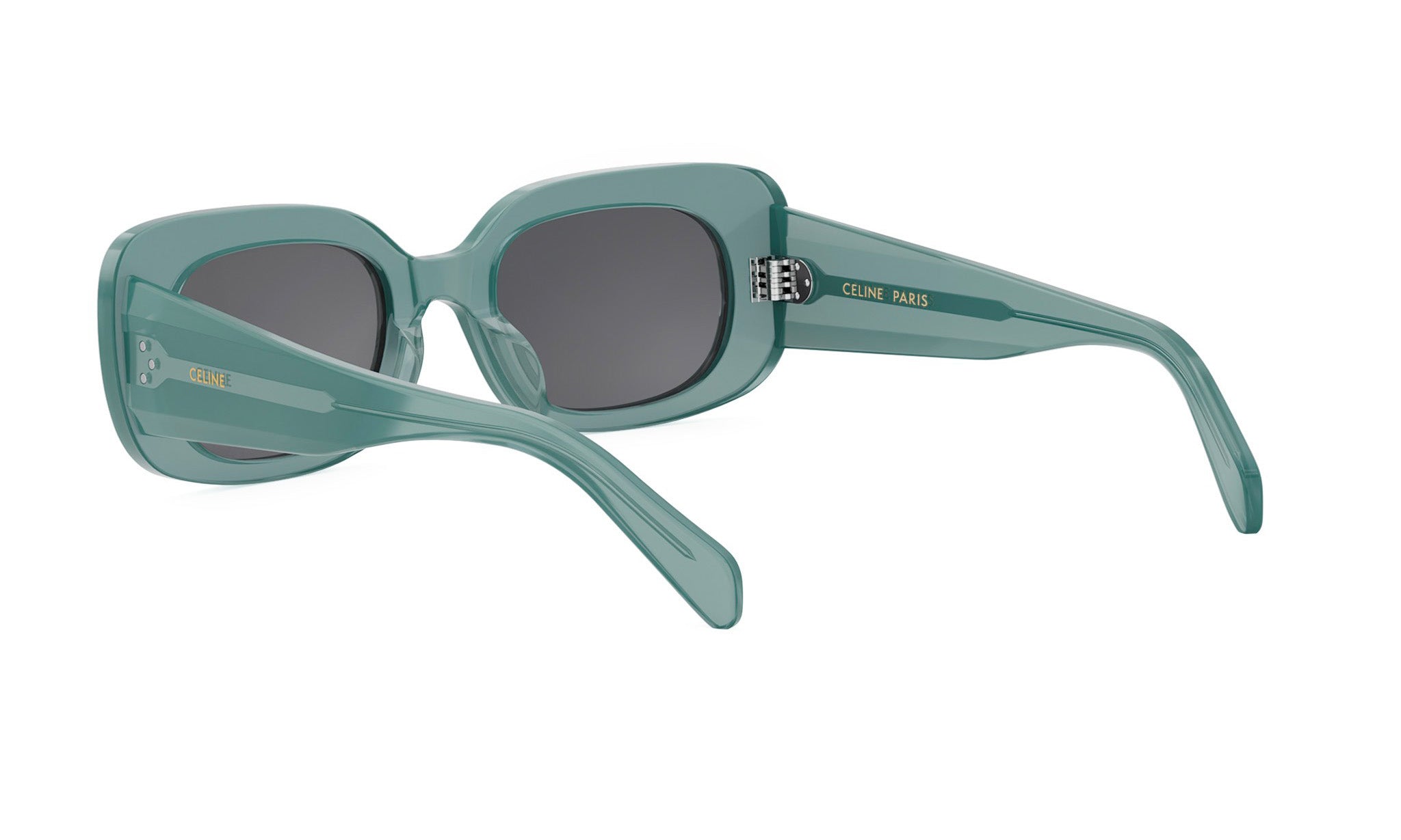 A pair of green-framed sunglasses with the Celine Paris logo on the temples.