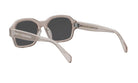 A pair of stylish sunglasses with a clear frame and dark lenses.