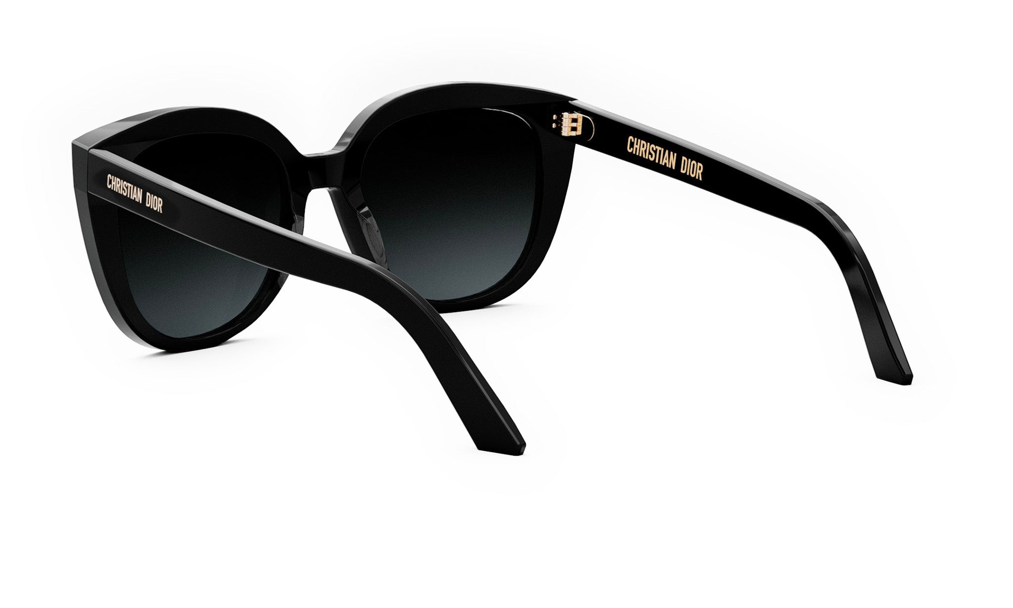 A pair of black sunglasses with gold accents, featuring the brand name "CHRISTIAN DIOR" on the frame.
