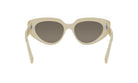 A pair of beige-colored sunglasses with dark lenses.