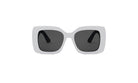 A pair of white, square-framed sunglasses with dark lenses.