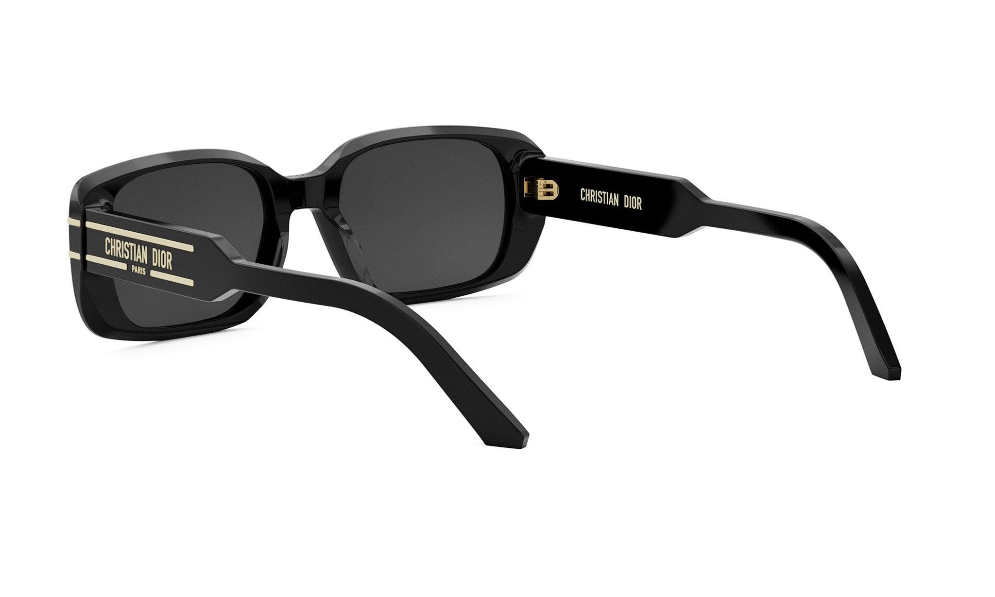 A pair of black sunglasses with gold accents and the logo of Christian Dior.