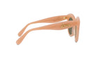 A pair of peach-colored sunglasses with the word "Lesse" engraved on the frame.