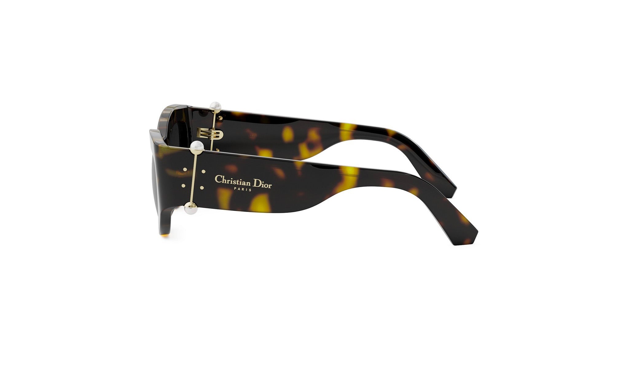 A pair of sunglasses with a tortoiseshell frame and the Christian Dior logo visible.