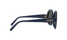 A pair of navy blue round sunglasses with gold text on the frame.