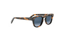 A pair of stylish sunglasses with a tortoiseshell frame and dark blue lenses.