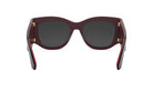A pair of dark-colored sunglasses with a red frame.