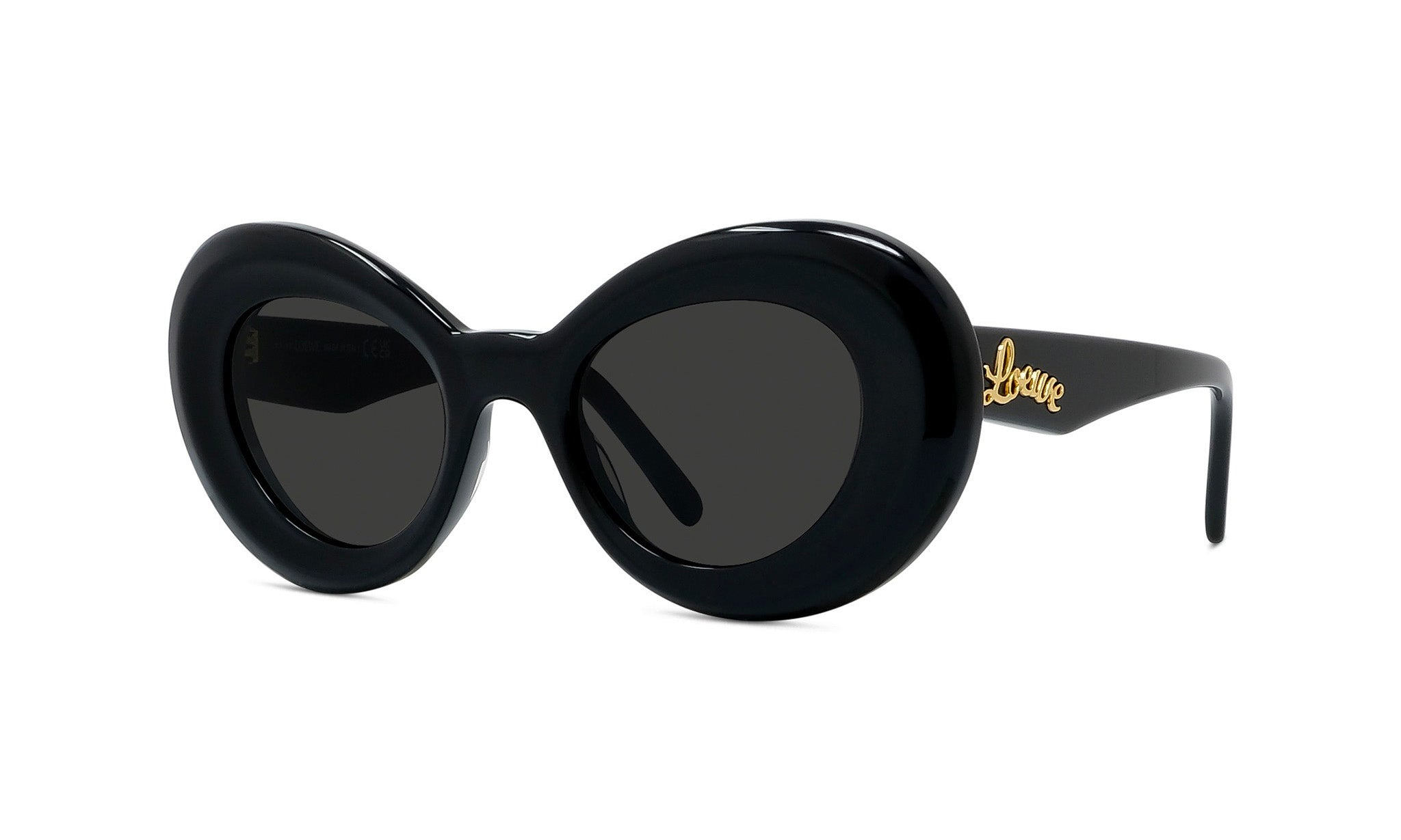 A pair of black, round sunglasses with a gold logo on the frame.