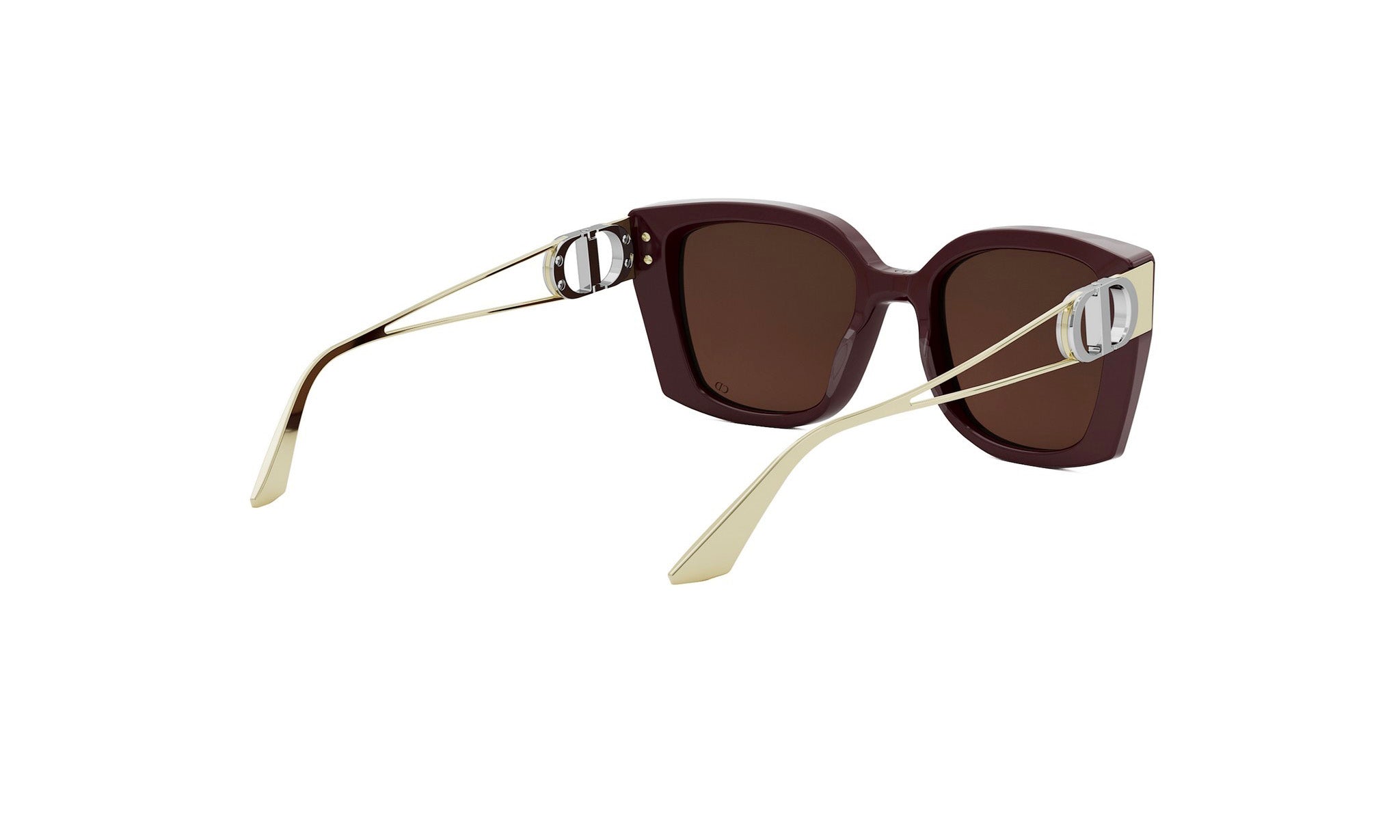 A pair of dark brown sunglasses with gold accents, featuring a large D-shaped frame and a smaller D-shaped temple.