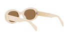 A pair of cream-colored sunglasses with a dark brown lens.