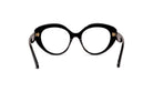 A pair of black cat-eye framed glasses with gold accents.