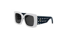 A pair of white and black sunglasses with a unique perforated frame design.