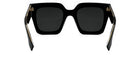 A pair of black sunglasses with gold accents, featuring a square frame and dark lenses.