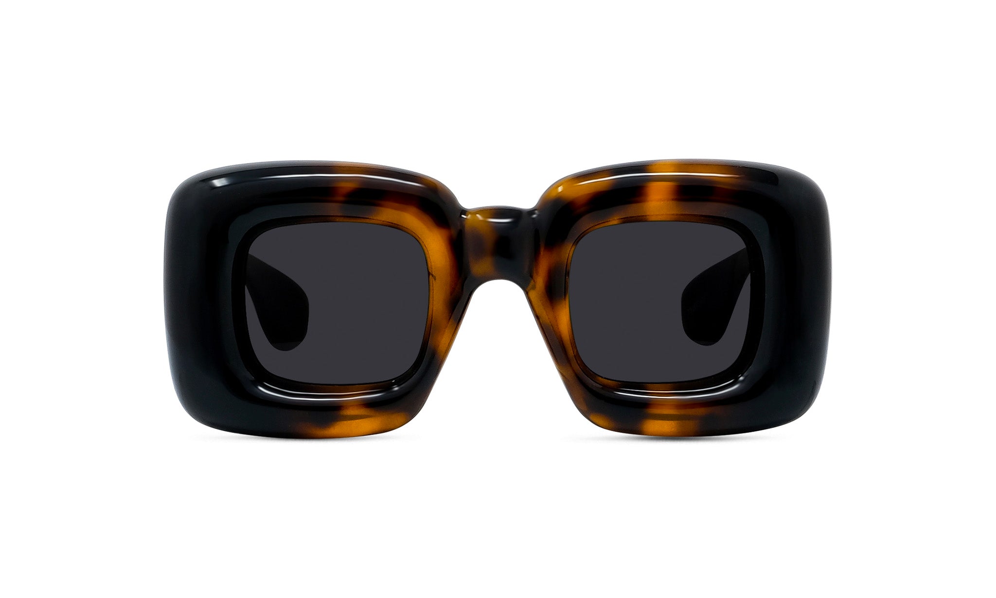 A pair of tortoiseshell-framed sunglasses with dark lenses.
