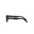 A pair of black Christian Dior sunglasses with gold lettering on the frame.