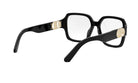A pair of black-framed glasses with gold accents, featuring a Dior logo on the temples.