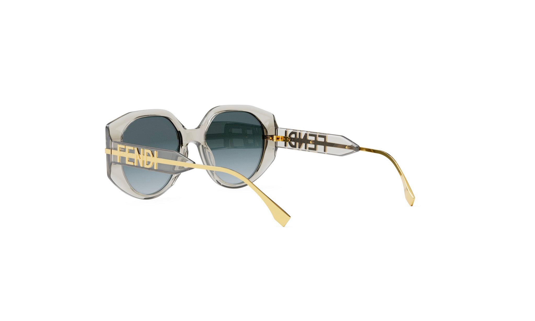 A pair of stylish sunglasses with a gold frame and a grey lens.