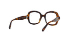 A pair of tortoiseshell-framed glasses with a dark tortoiseshell frame and a lighter tortoiseshell frame.
